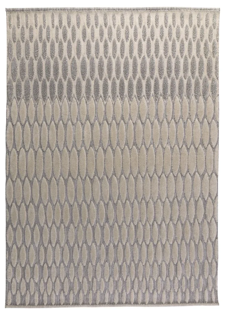 An ivory rug with silvery silk-accent drops — direction-dependent shimmer